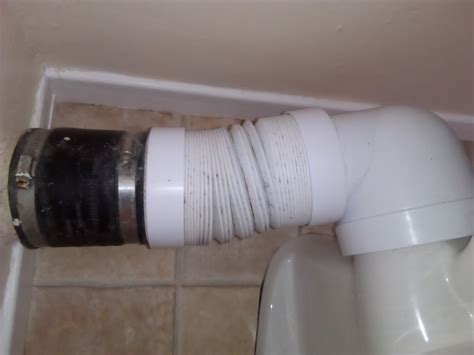 Flexible toilet soil pipe leaking (bodge suggestions please)